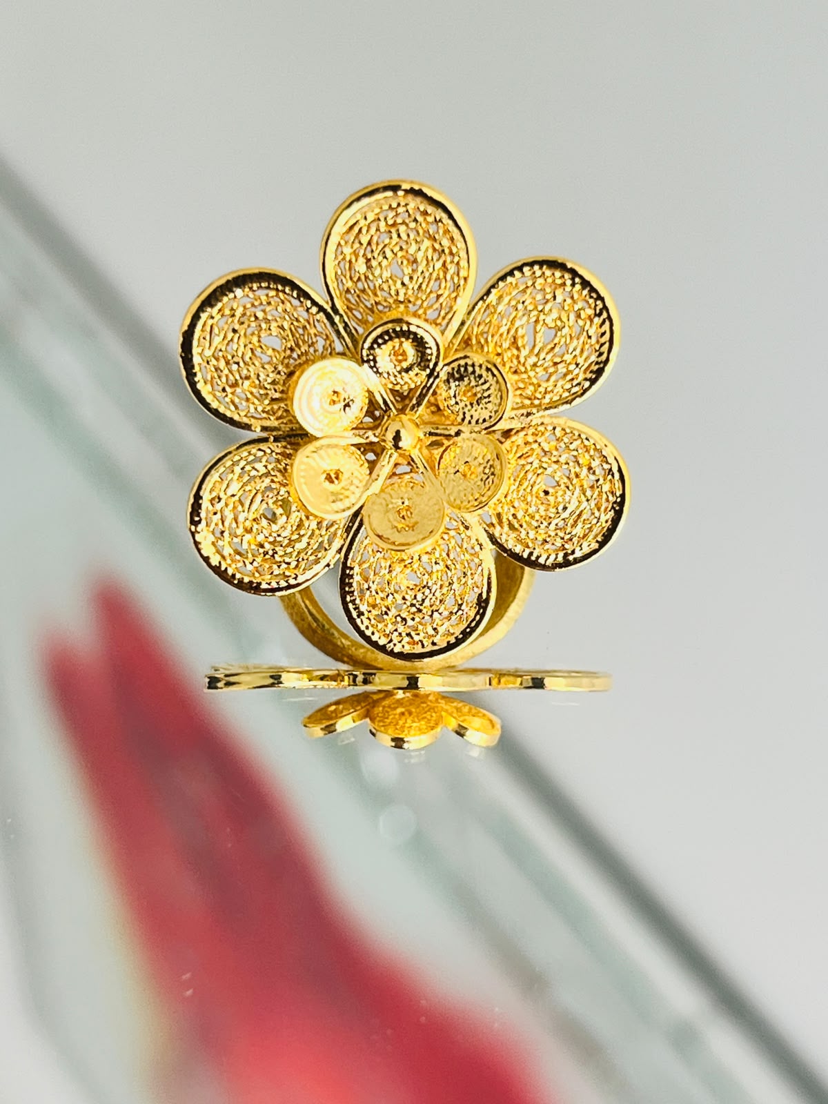 Anillo Flor Redonda en oro 18K