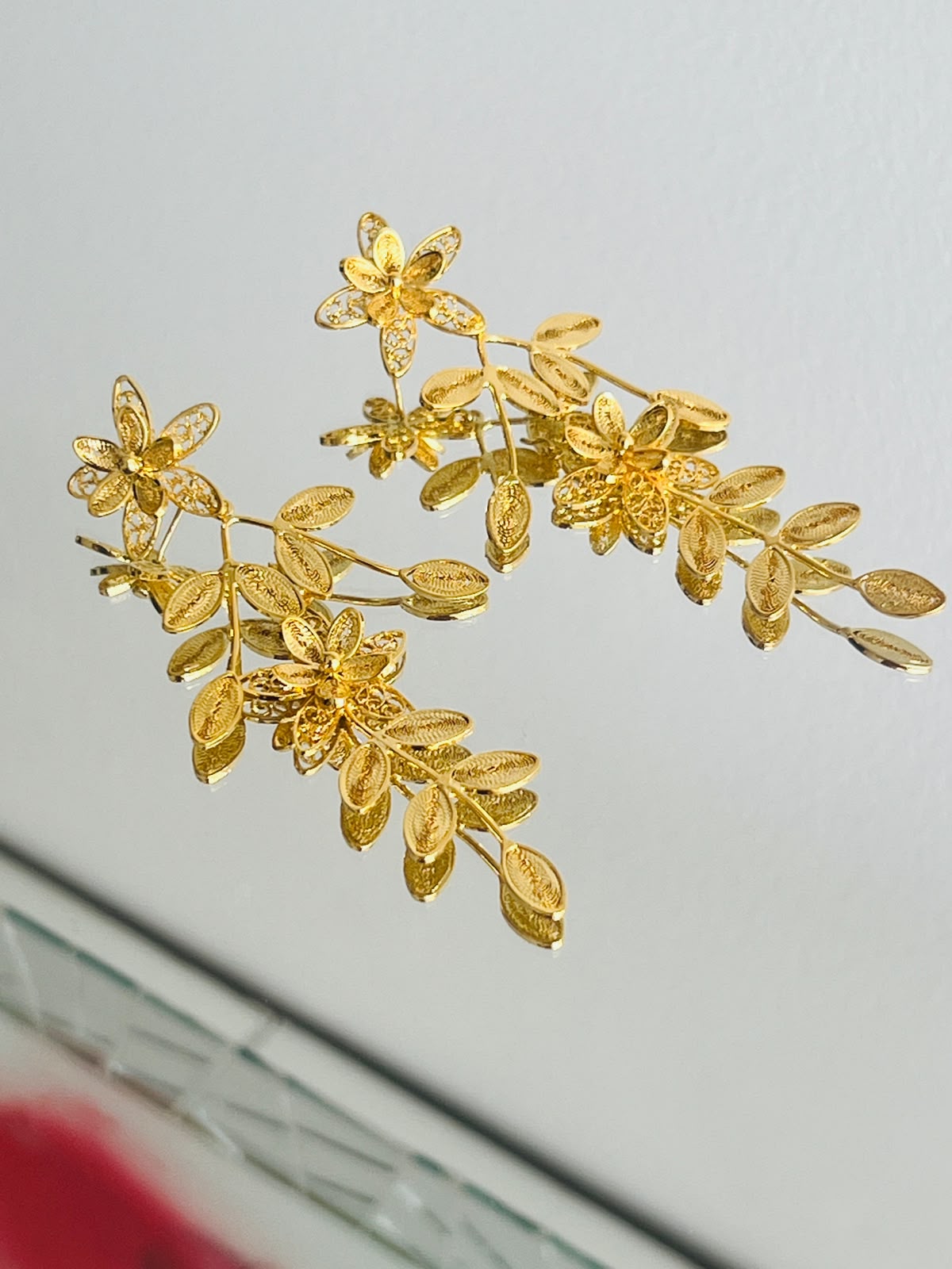 Aretes Rama con Flores en oro 18K